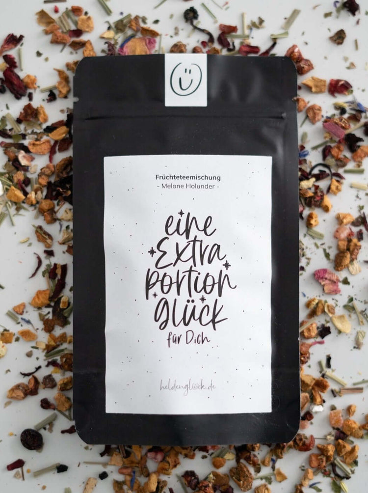 Tee mit Spruch oder Motiv Eine Extraportion in schwarz weiss