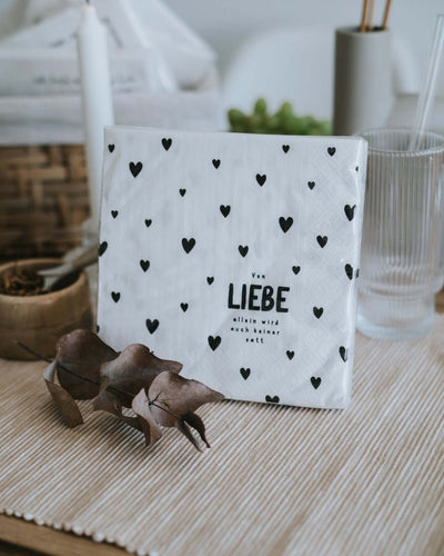 Serviette mit Spruch oder Motiv Von Liebe allein in schwarz weiss