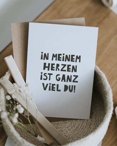 Postkarte mit Spruch und motiv In meinem Herzen in schwarz weiss