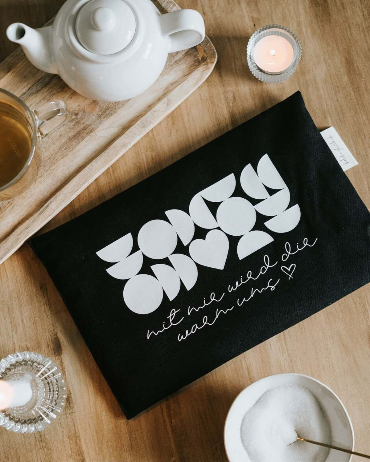Wärmekissen, Körnerkissen mit Spruch oder Motiv Warm ums Herz in schwarz weiss