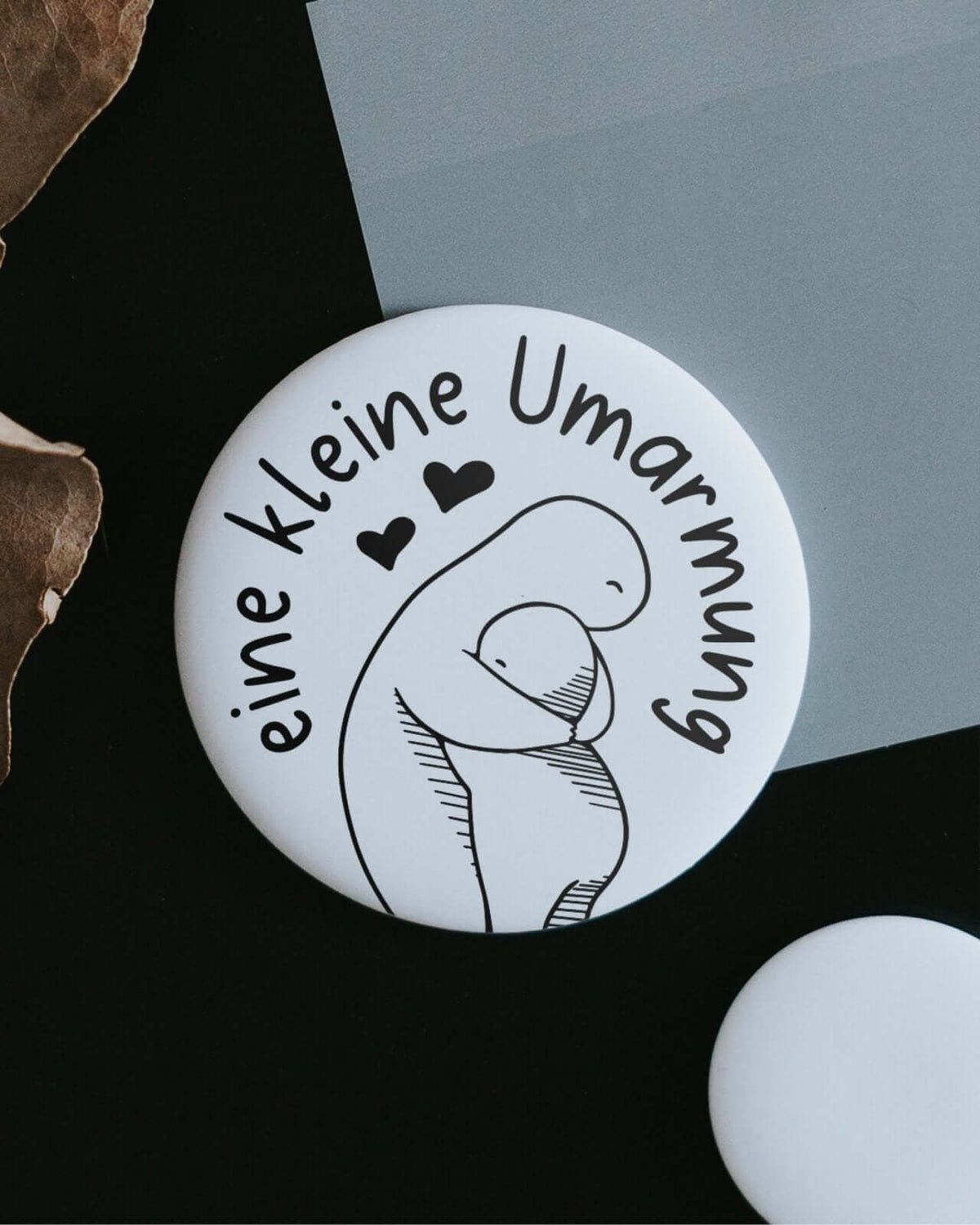 Magnete mit Spruch oder Motiv Kleine Umarmung · klein in schwarz weiss