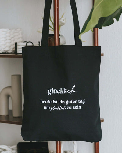 Baumwollbeutel mit Spruch oder Motiv Glücklich sein in schwarz weiss