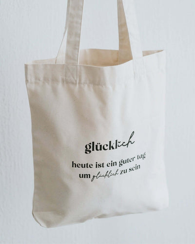 Baumwollbeutel mit Spruch oder Motiv Glücklich sein in schwarz weiss