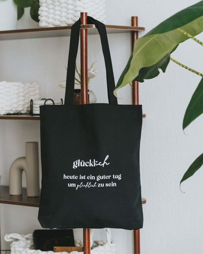 Baumwollbeutel mit Spruch oder Motiv Glücklich sein in schwarz weiss