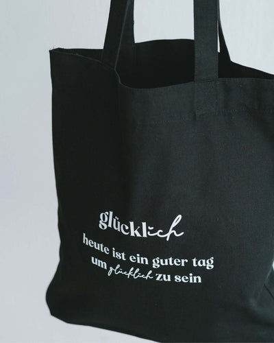 Baumwollbeutel mit Spruch oder Motiv Glücklich sein in schwarz weiss