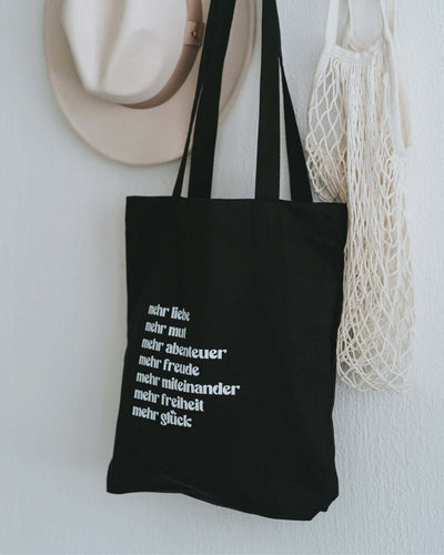 Baumwollbeutel mit Spruch oder Motiv Mehr Liebe in schwarz weiss