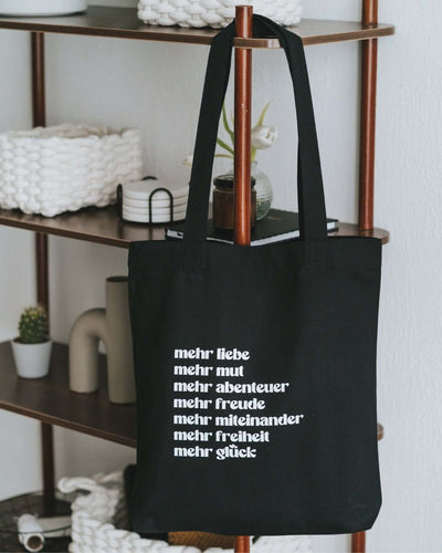 Baumwollbeutel mit Spruch oder Motiv Mehr Liebe in schwarz weiss