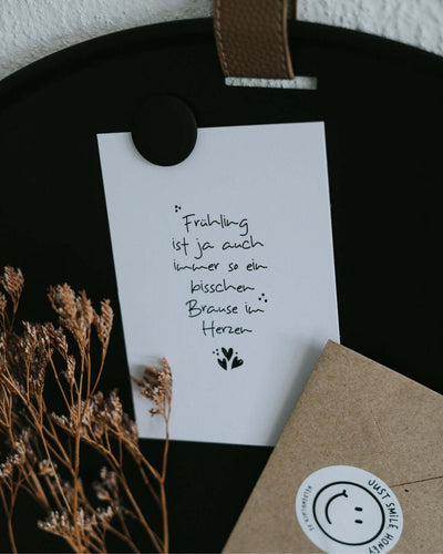 Postkarte mit Spruch und motiv Frühling in schwarz weiss