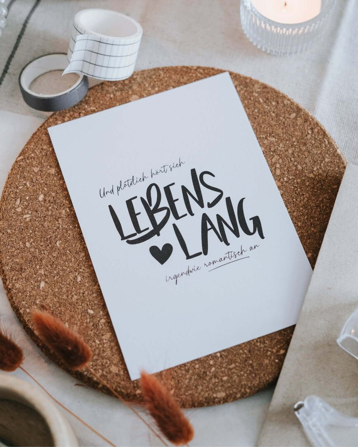 Postkarte mit Spruch und motiv Lebenslang in schwarz weiss