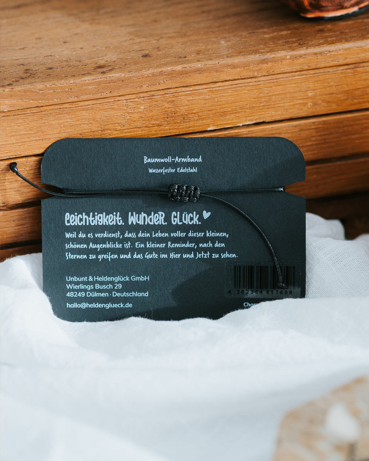 Rückseite der Geschenkkarte – Baumwoll-Armband mit wasserfestem Edelstahl.