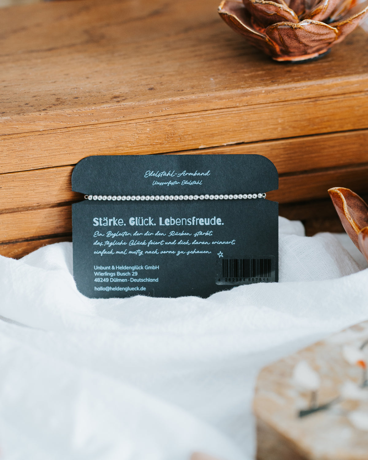Rückseite der Geschenkkarte – Edelstahl-Armband aus wasserfestem Edelstahl.