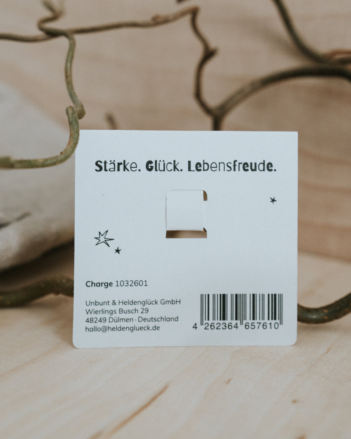 Rückseite der Geschenkkarte – „Stärke. Glück. Lebensfreude.“