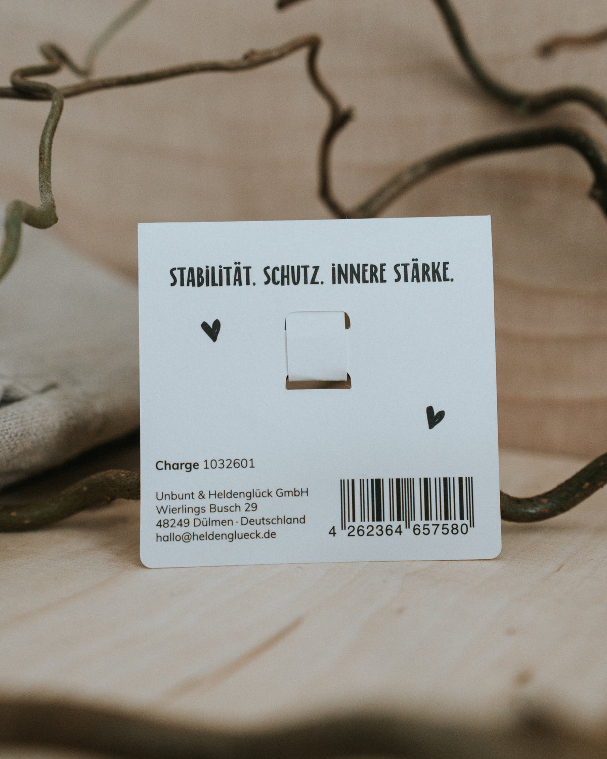 Rückseite der Geschenkkarte – „Stabilität. Schutz. Innere Stärke.“