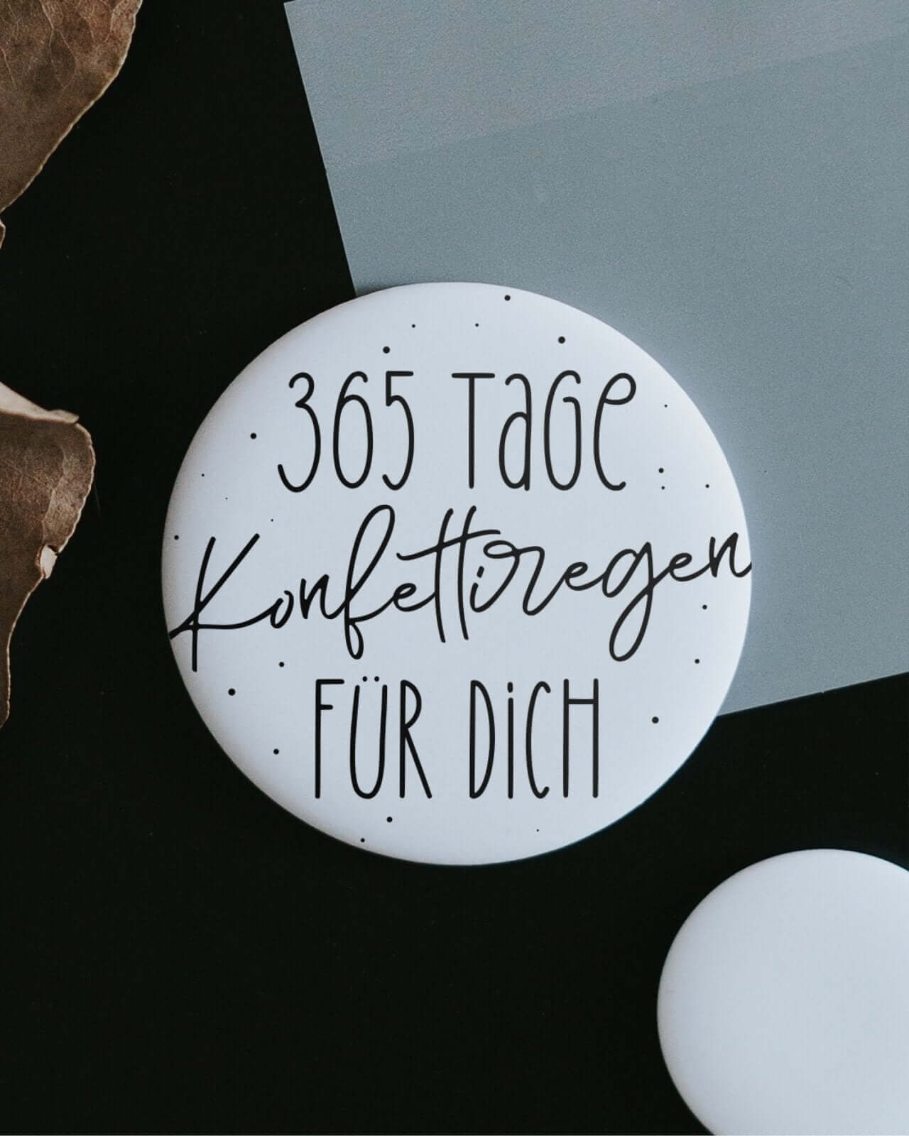Magnete mit Spruch oder Motiv Konfettiregen · klein in schwarz weiss