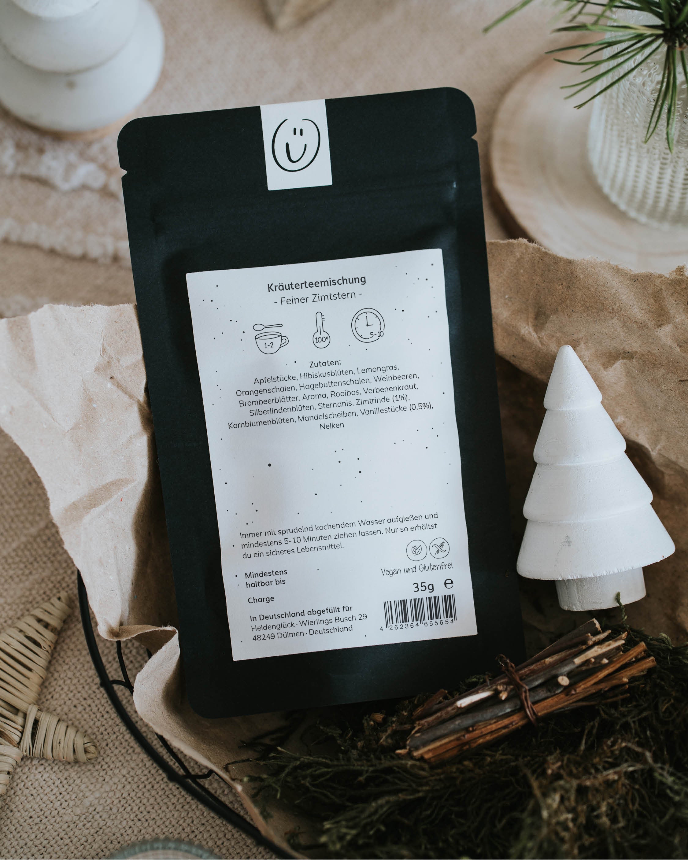 Kräutertee „Feiner Zimtstern“ mit Weihnachtsbotschaft auf nachhaltiger Verpackung