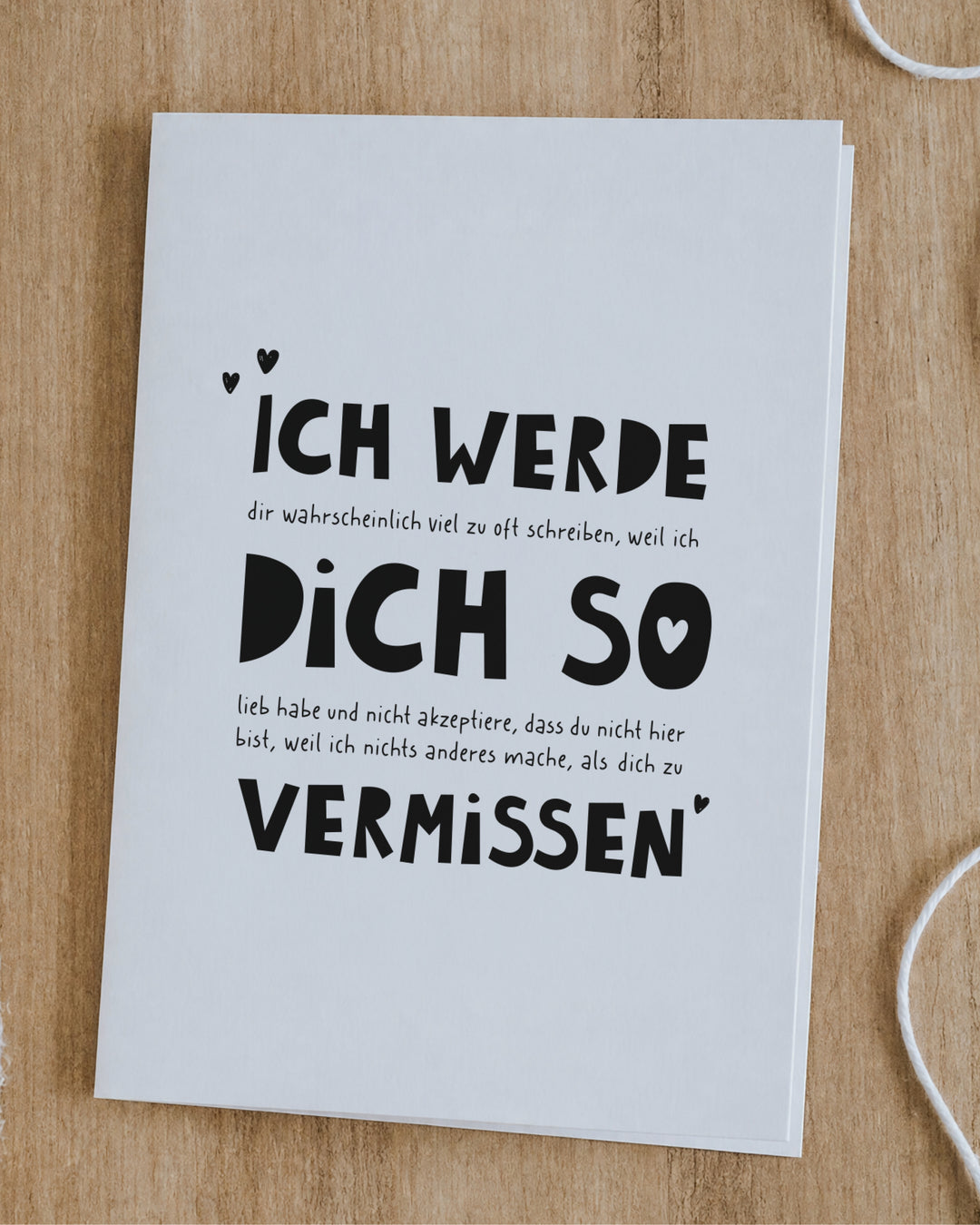 Abschiedskarte mit großem Schriftzug und feiner Botschaft zwischen den Zeilen