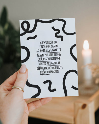 Moderne Wunschkarte mit positivem Spruch – bringt Farbe, Hoffnung und Leichtigkeit in graue Tage.