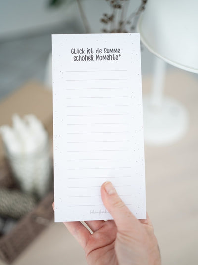 Notizblock mit Spruch „Momente" – stabiles Papier, klares Schwarz-Weiß
