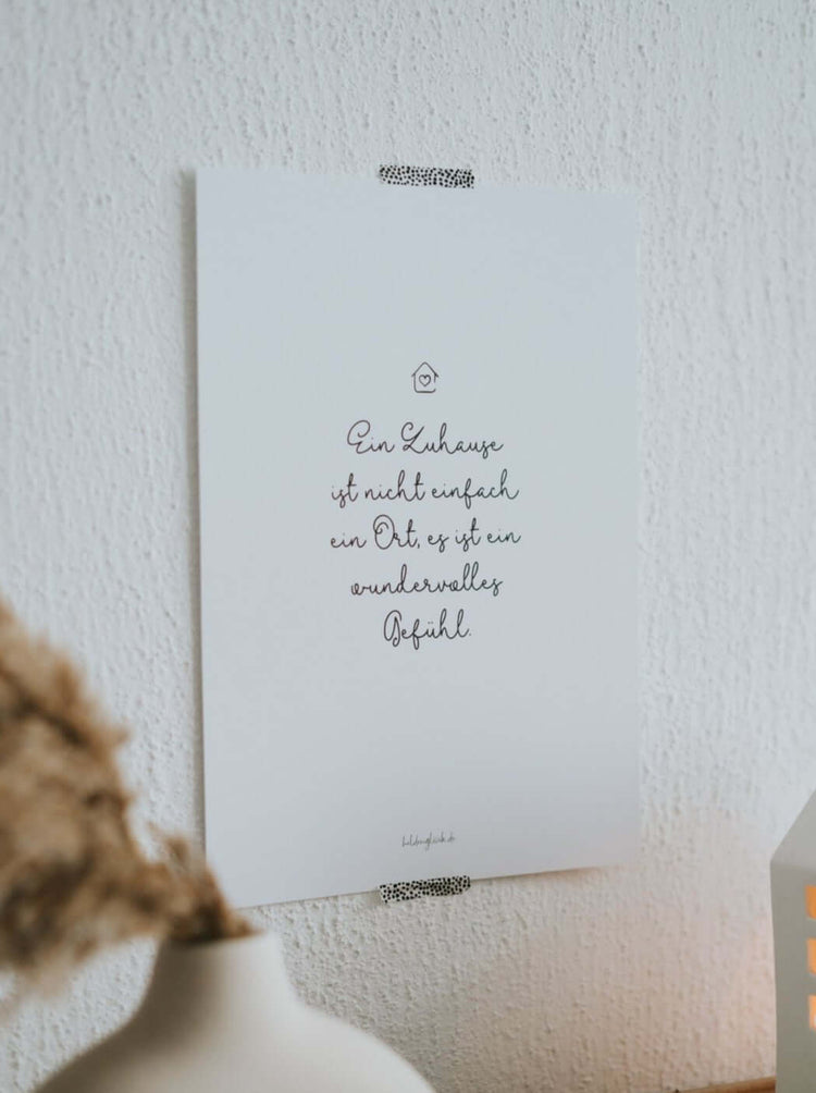 Poster mit Spruch oder Motiv Zuhause ist ein Gefühl in schwarz weiss